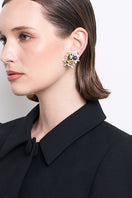 A pair of yellow Camellia earrings by Aidan & Ice, featuring floral design, hanging from silver hooks.
