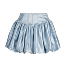 Scarlett Gasque Eclipse mini skirt in ice melt fabric, front view showing sleek, fitted design with subtle sheen and modern style.