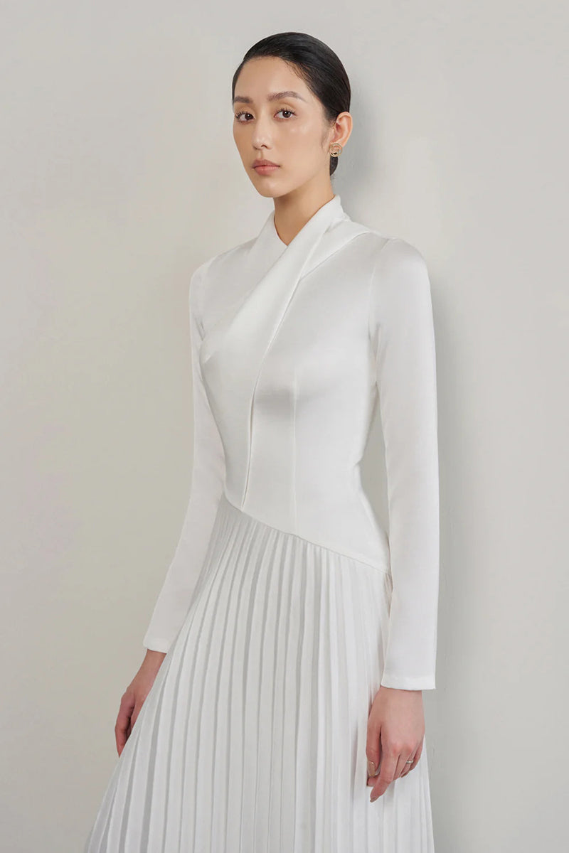 Elegant white taffeta silk gown by EEGEN STUDIO, featuring a smooth, flowing design perfect for formal occasions.