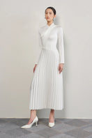 Elegant white satin taffeta silk gown by EEGEN STUDIO, featuring a flowing design and intricate details for formal occasions.