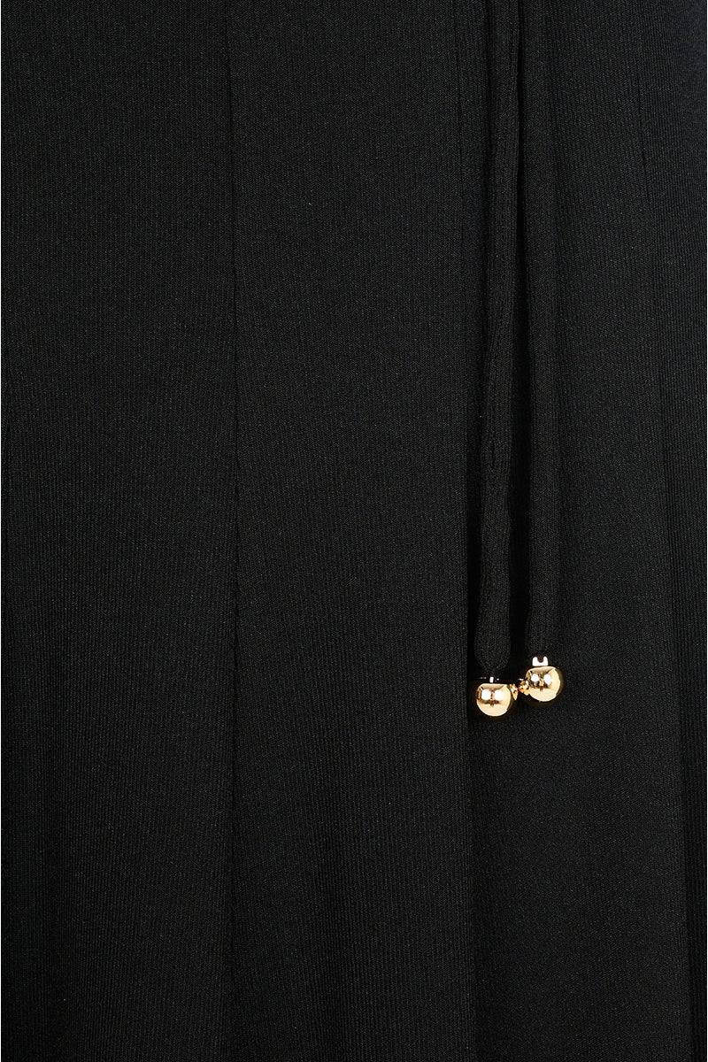 Black Peper Rib Knit Maxi Dress by EEGEN Studio, featuring a fitted ribbed knit design and long sleeves.