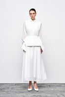 White crinkle chiffon maxi dress by EEGEN STUDIO, flowing fabric and elegant design, perfect for summer or special occasions.