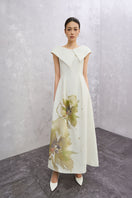 White Lilia Maxi Dress by EEGEN STUDIO featuring a flowy silhouette and elegant design, shown from the front.
