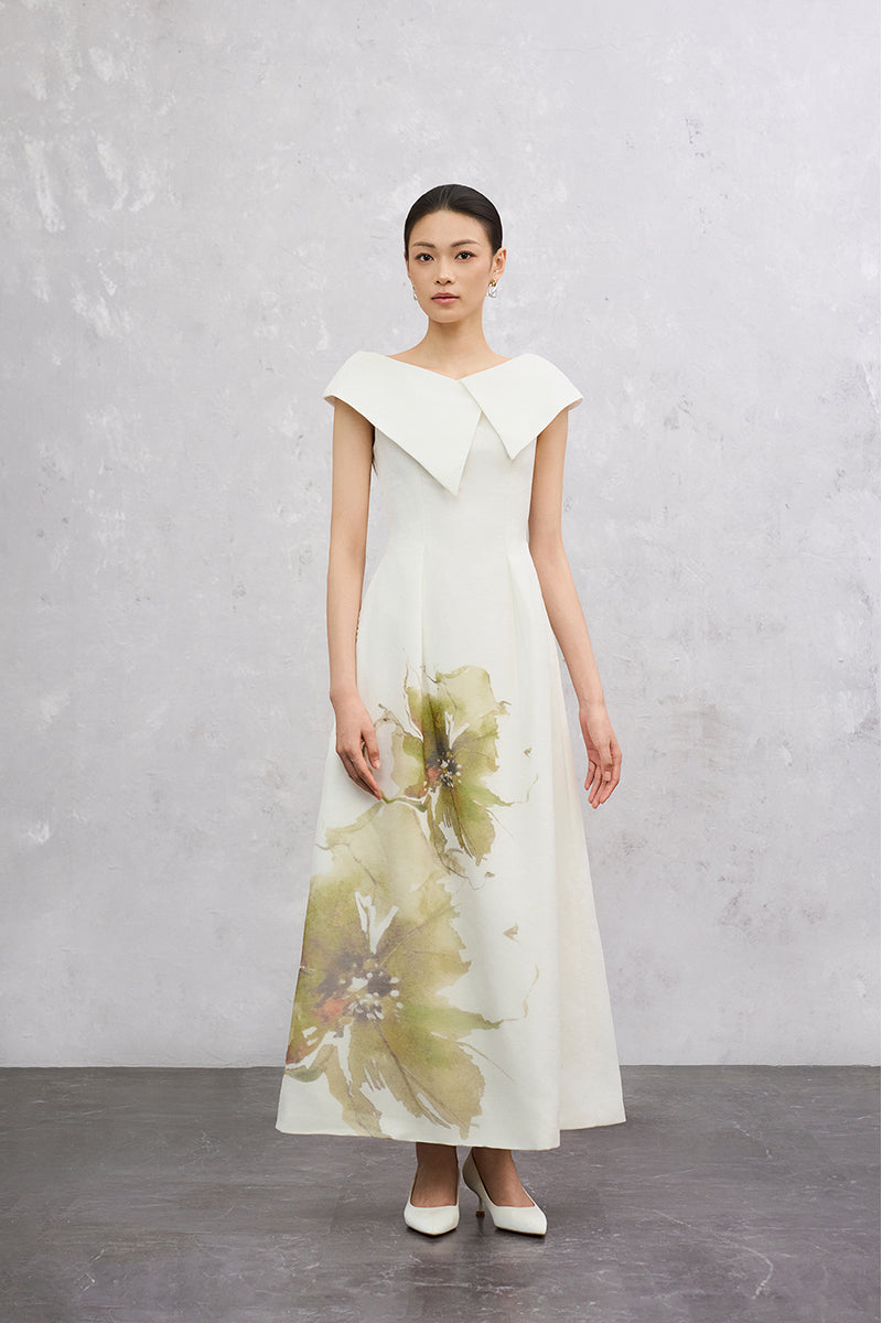 White EEGEN STUDIO LILIA maxi dress with flowing fabric and elegant design, front view showing neckline and sleeveless style.