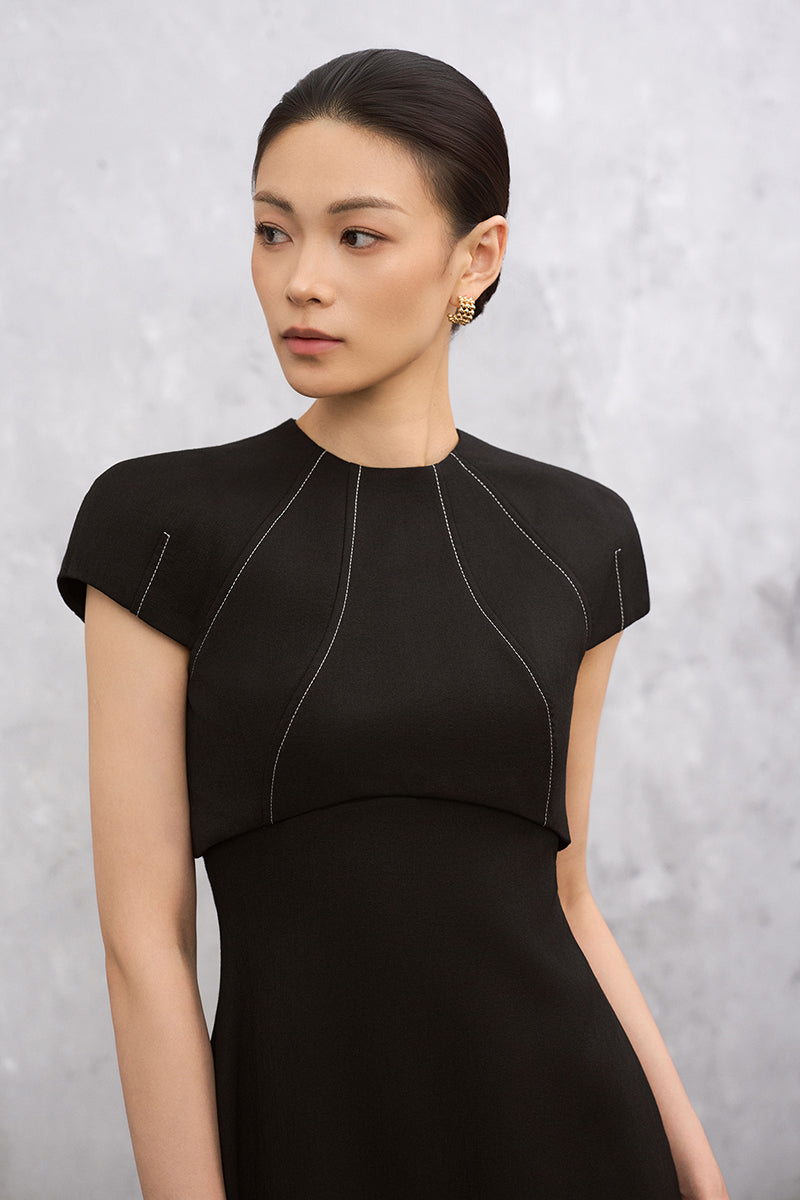 Black LYRA maxi dress by EEGEN STUDIO featuring a flowing silhouette and elegant design, perfect for stylish occasions.