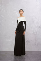 Black and white DARELLA gown by EEGEN STUDIO, featuring elegant fabric and classic design, shown on a mannequin.