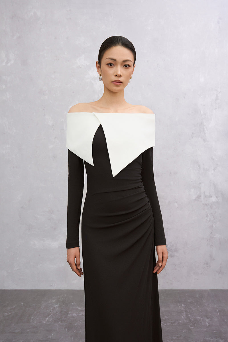 Black and white DARELLA maxi dress by EEGEN STUDIO, flowing fabric with a stylish, elegant design.