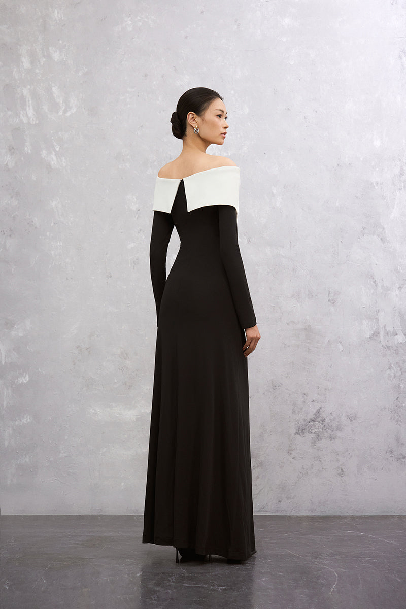 Black and white DARELLA maxi dress by EEGEN STUDIO, flowing fabric and elegant design displayed on a model.