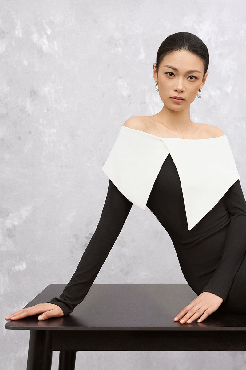 Black and white Darella maxi dress by EEGEN STUDIO, flowing fabric with a stylish, elegant design perfect for summer wear.