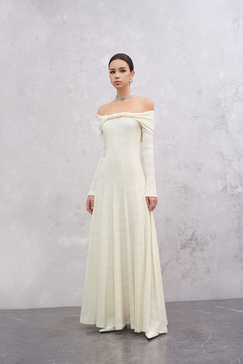 White Elowen Maxi Dress by EEGEN STUDIO, flowing fabric, sleeveless design, and elegant silhouette displayed in the image.