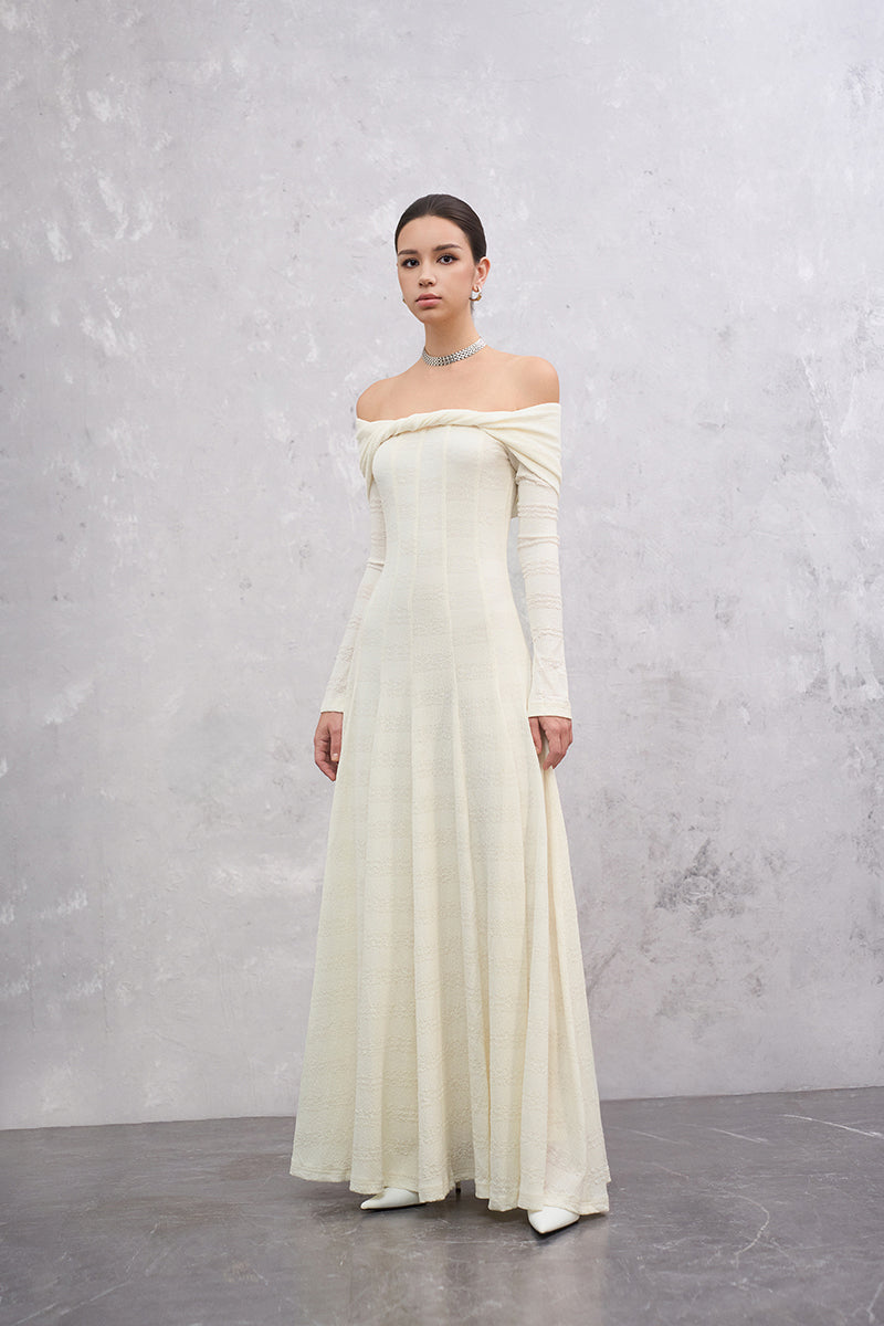 White Elowen maxi dress by EEGEN STUDIO, flowing off-white fabric with a relaxed fit and elegant design.