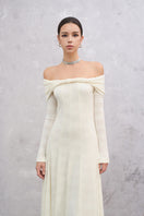 White Elowen maxi dress by EEGEN STUDIO featuring flowing fabric and elegant design, displayed on a model.