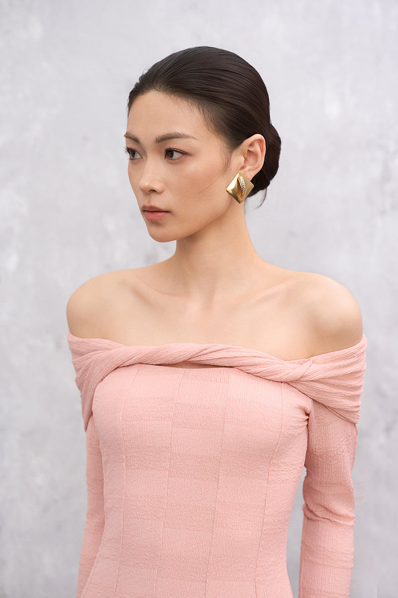 Pink Elowen maxi dress by EEGEN STUDIO, flowing fabric with a relaxed fit and elegant design, shown on a model.