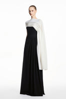 Black and white spandex knit gown by EEGEN STUDIO, featuring a sleek, fitted design perfect for elegant occasions.