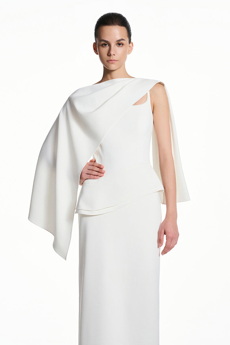 White spandex maxi dress by EEGEN STUDIO featuring a sleek, fitted design and elegant flowy fabric.
