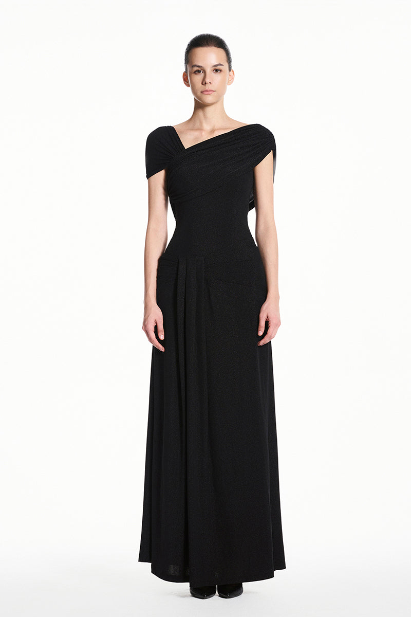 Black spandex knit maxi dress by EEGEN STUDIO, shown on a model with a fitted silhouette and long sleeves.