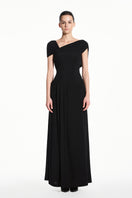 Black spandex knit maxi dress by EEGEN STUDIO, featuring a fitted silhouette and stylish long sleeves.