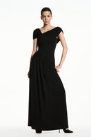 Black spandex knit maxi dress by EEGEN STUDIO, featuring a fitted silhouette and long sleeves.