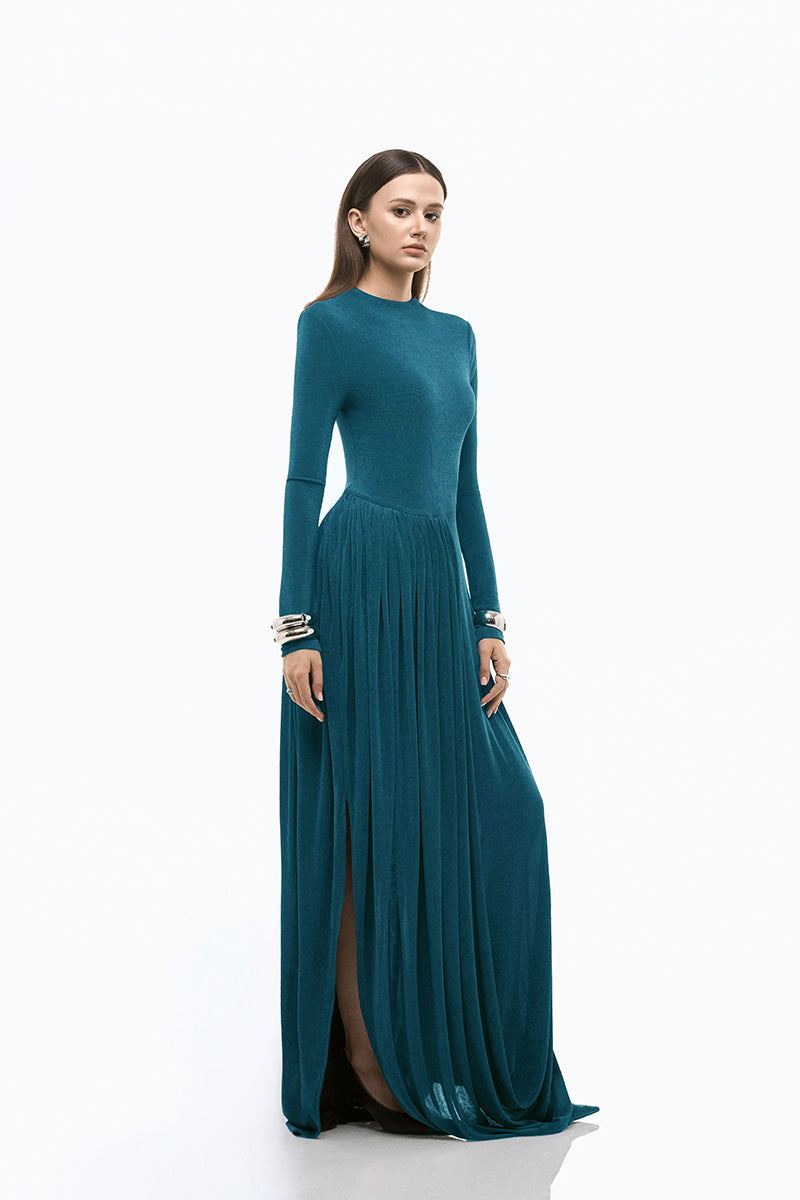 Blue light twinkle jersey spandex maxi dress by EEGEN STUDIO, flowing fabric and fitted silhouette for elegant evening wear.