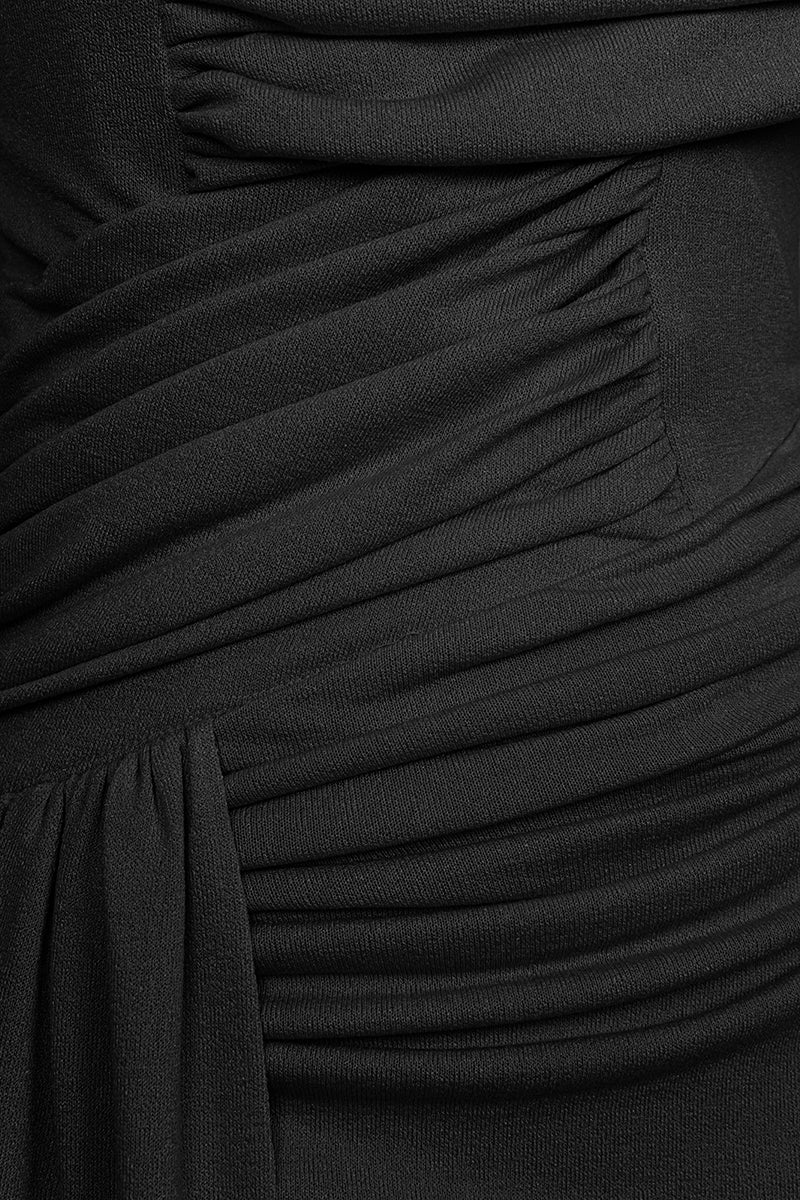 Black spandex knit maxi dress by EEGEN STUDIO featuring a fitted silhouette and long sleeves, perfect for casual or evening wear.