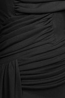 Black spandex light knit gown by EEGEN STUDIO, featuring a fitted silhouette and long sleeves, perfect for elegant occasions.