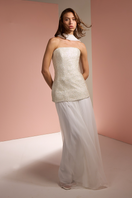 White strapless top and skirt co-ords set with matching scarf by Joanna Andraos, styled in a chic editorial look.