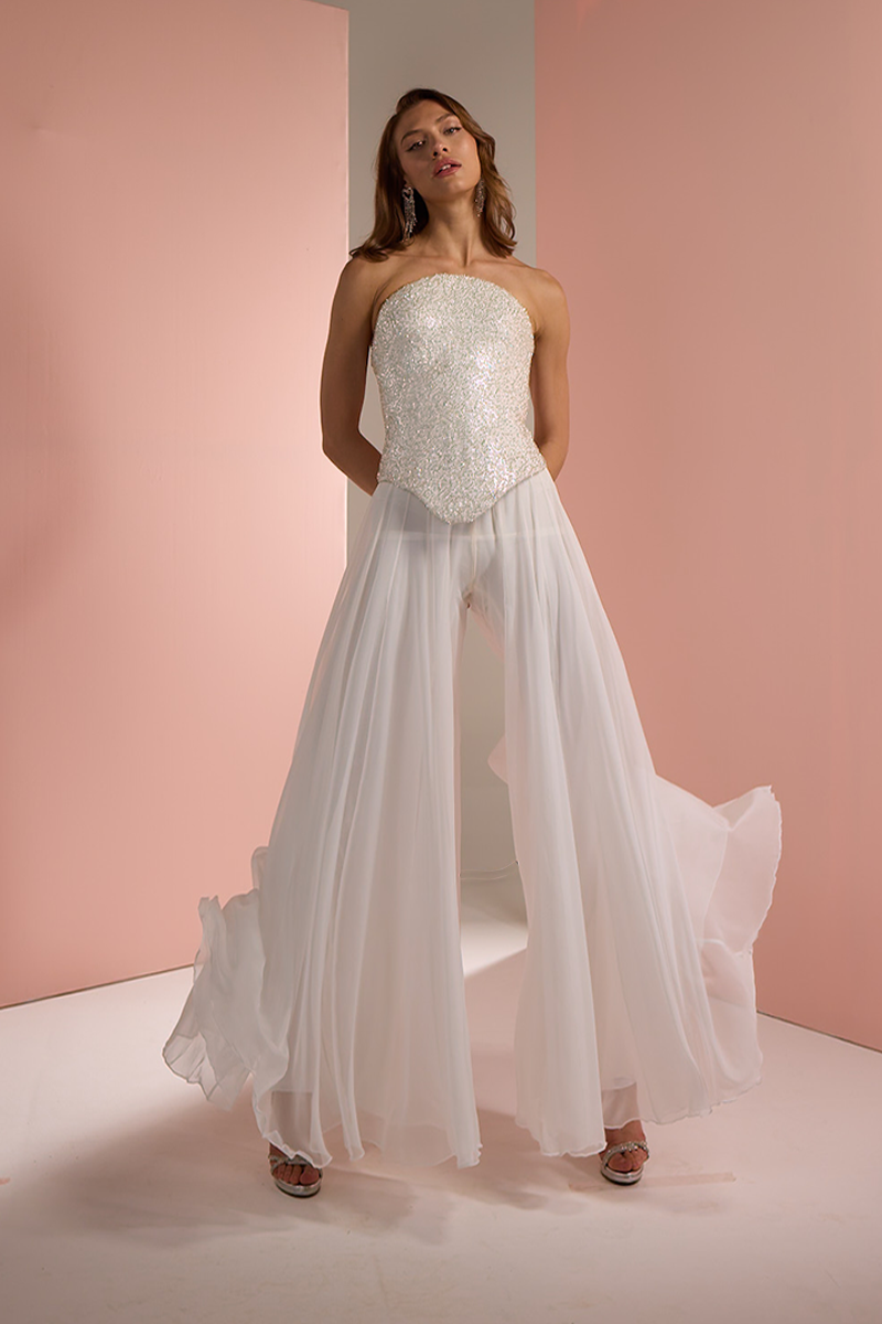 White Joanna Andraos corset top with matching palazzo trousers, stylish co-ord set perfect for elegant fashion looks.