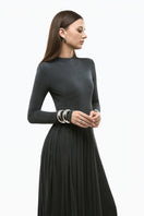 Gray light twinkle jersey spandex gown by EEGEN STUDIO, featuring a sleek, fitted design with shimmering fabric and elegant style.