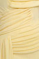 Yellow spandex knit gown by EEGEN STUDIO featuring a fitted silhouette and long sleeves.