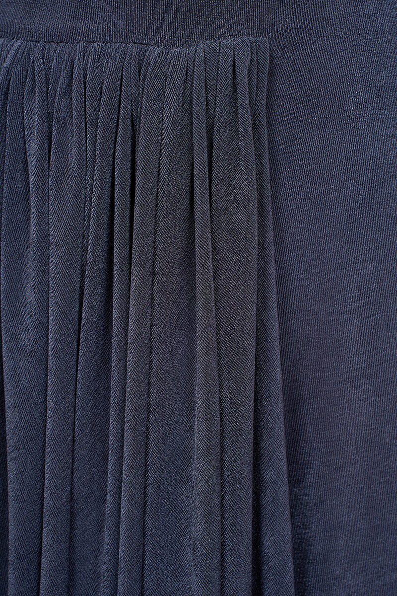 Gray light twinkle jersey spandex gown by EEGEN STUDIO, featuring a sleek, fitted design with shimmering details.