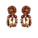 Gold Amora earrings by Aidan & Ice featuring elegant hoop design with decorative detailing for a stylish look.