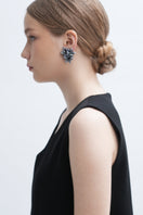 Gray Greta earrings by Aidan & Ice featuring sleek, modern design with elegant gray tones and geometric shapes.