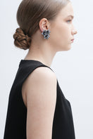 Gray Greta earrings from Aidan & Ice featuring elegant design, displayed on a neutral background.