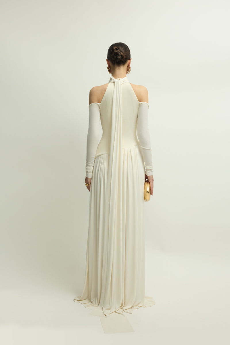 Elegant ivory EIRA gown by Jenny K Tran, featuring flowing fabric and intricate detailing, perfect for formal occasions.