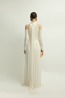 Elegant ivory EIRA gown by Jenny K Tran, featuring flowing fabric and intricate detailing, perfect for formal occasions.