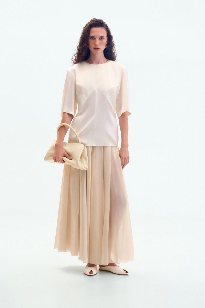 Cream sheer midi skirt by ELENAREVA, featuring lightweight, flowy fabric and a stylish, elegant silhouette.