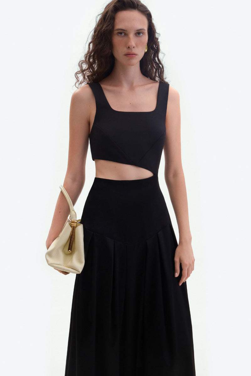 Black midi cutout dress by ELENAREVA, showcasing a stylish midi-length dress with cutout details and a fitted silhouette.