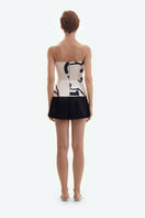 Cream corset top with black graphic lines by ELENAREVA, featuring a fitted design and stylish pattern, perfect for trendy tops.