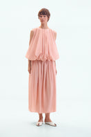 Dusky pink balloon midi skirt by ELENAREVA, flowing fabric with a gathered waist, stylish and feminine for casual or dressy wear.