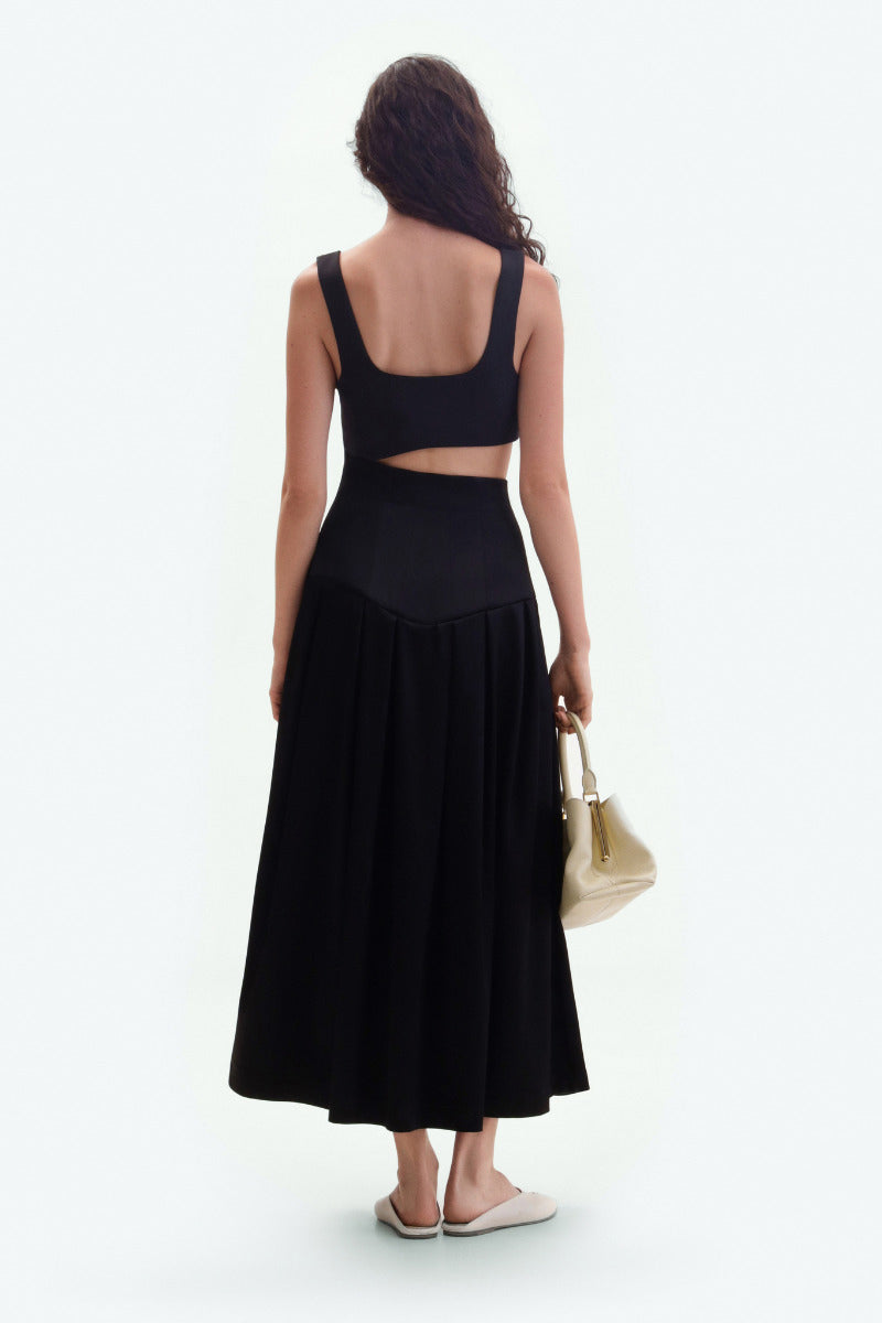 Black midi cutout dress by ELENAREVA, featuring a stylish midi dress with cutout details and a sleek silhouette.