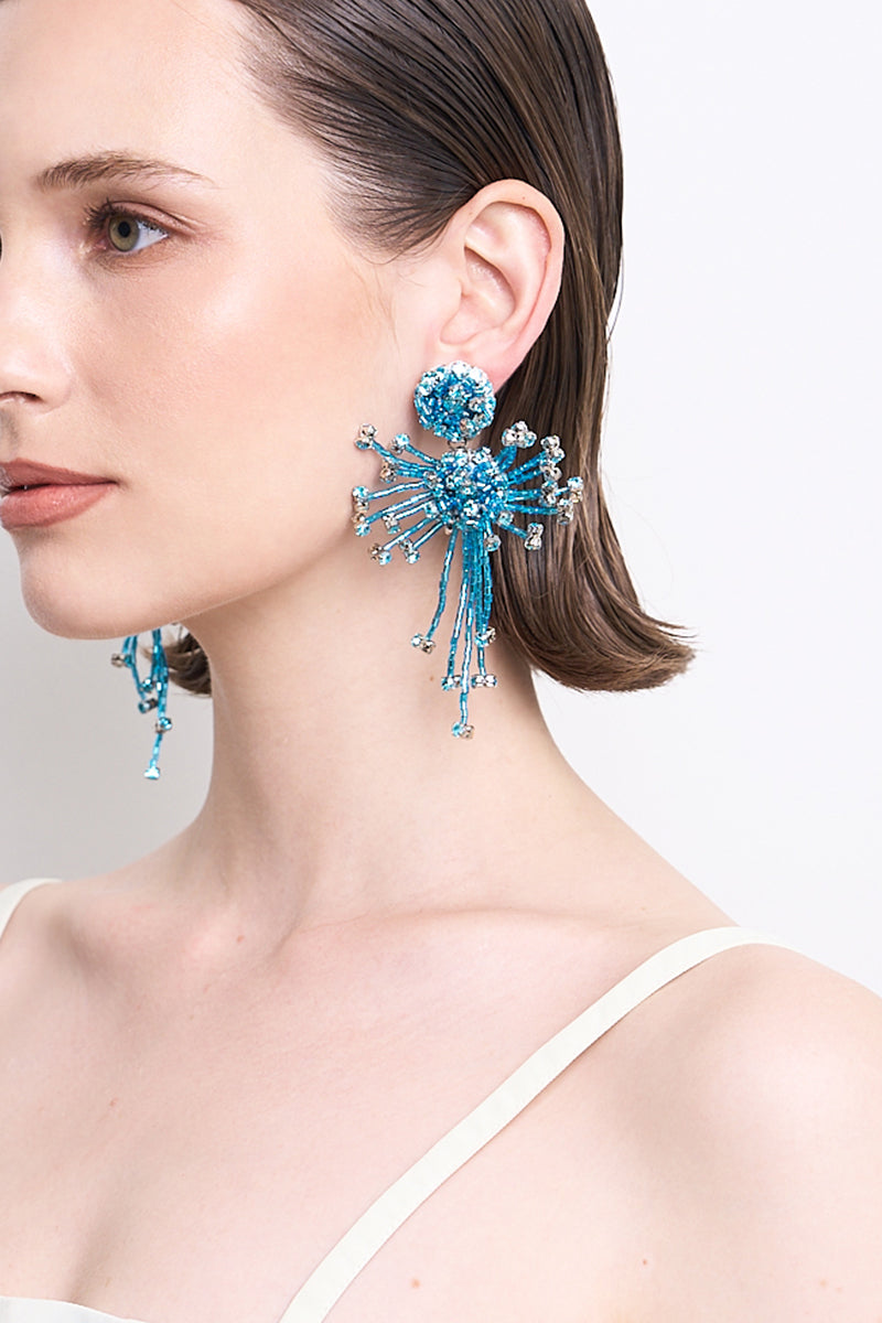 Aidan & Ice LILLA Blue Drop Earrings featuring elegant blue drops hanging from silver hooks, jewelry accessory for women.