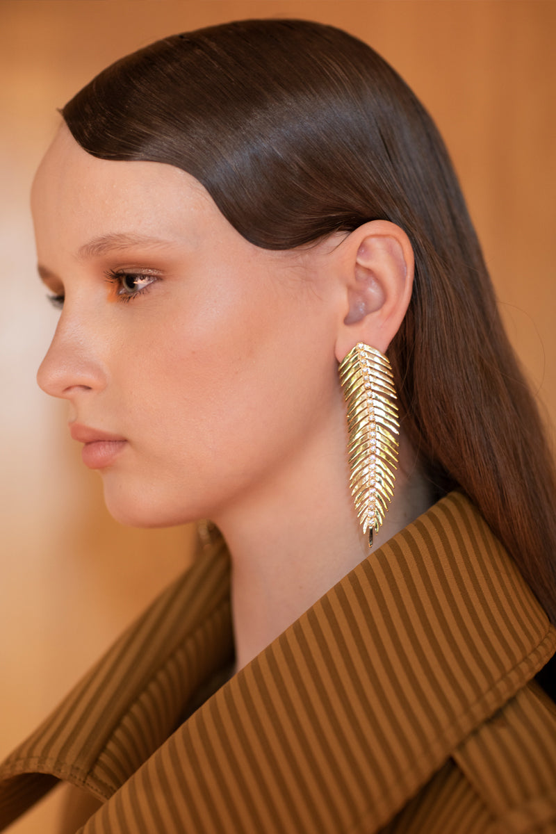 Gold Elise earrings by Jessica K featuring sleek, modern design with a polished finish, perfect for everyday wear or special occasions.