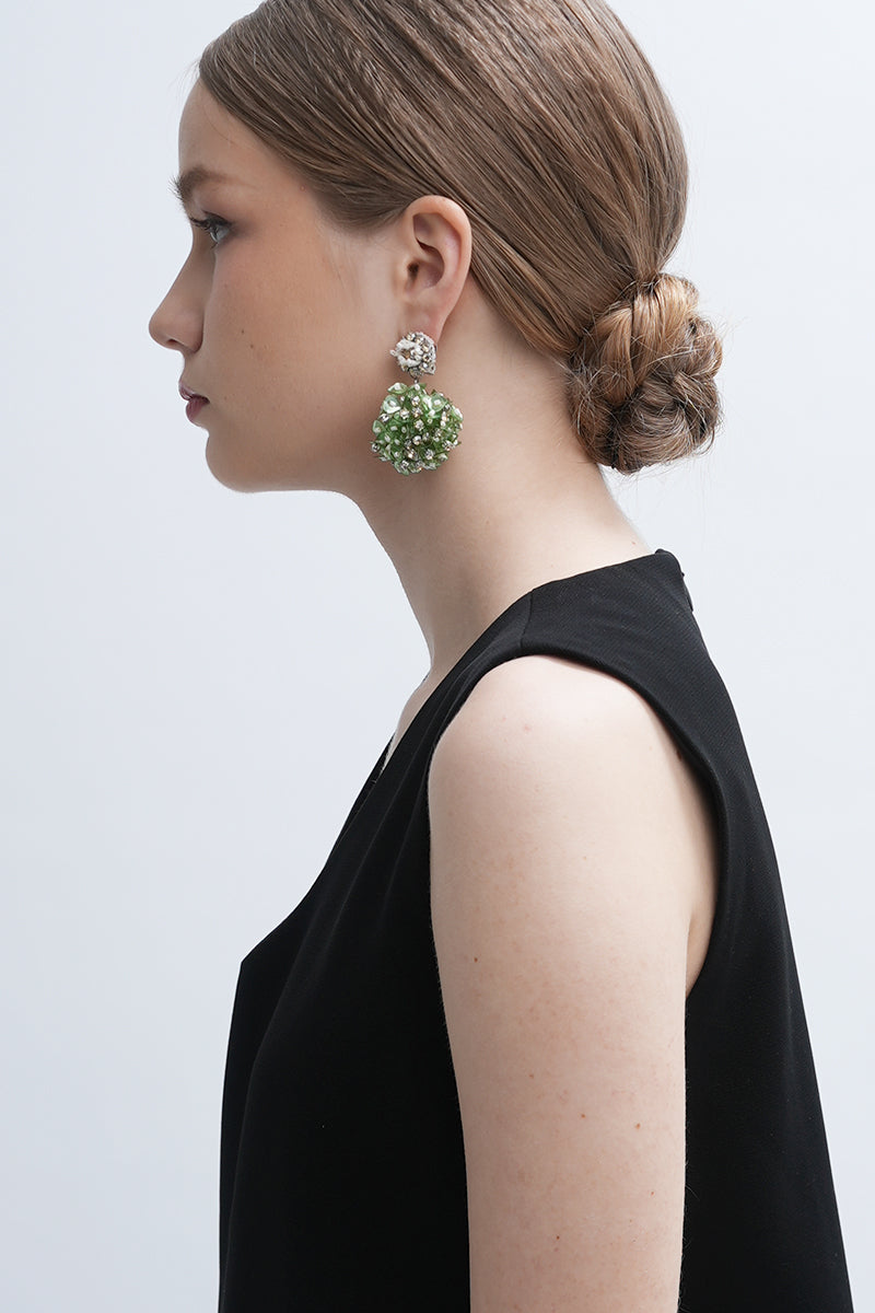 Aidan & Ice Louise earrings featuring elegant hoop design with sparkling accents, displayed on a neutral background