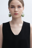 Aidan & Ice Louise earrings featuring elegant, silver-toned dangle earrings with intricate design details.