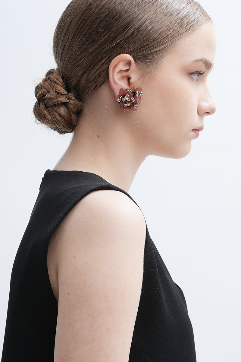 Aidan & Ice Peach Greta earrings featuring peach-colored dangle earrings with gold accents on a white background.