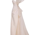 Elegant Tarık Ediz Ephesus gown in vanilla, featuring flowing fabric and intricate detailing, perfect for formal occasions.