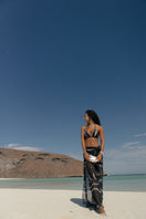 Nelblu Morpho Top black bikini with adjustable straps, featuring a sleek, modern design perfect for summer beachwear.