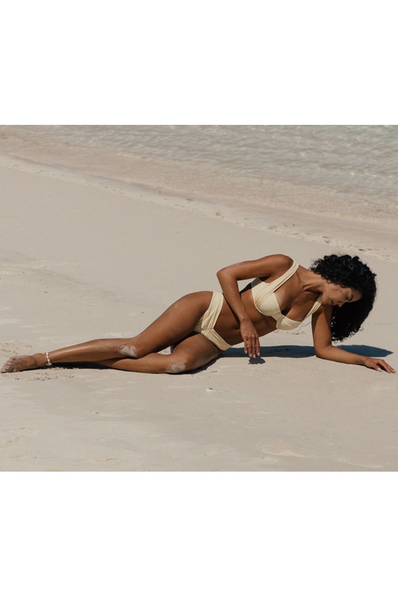 Nelblu Marea bikini bottom with full coverage in blonde color, featuring a smooth fabric and classic bikini style.