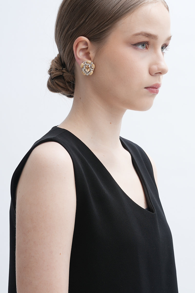 Aidan & Ice sand cascade earrings featuring layered gold-tone sand-inspired design and elegant dangle style.