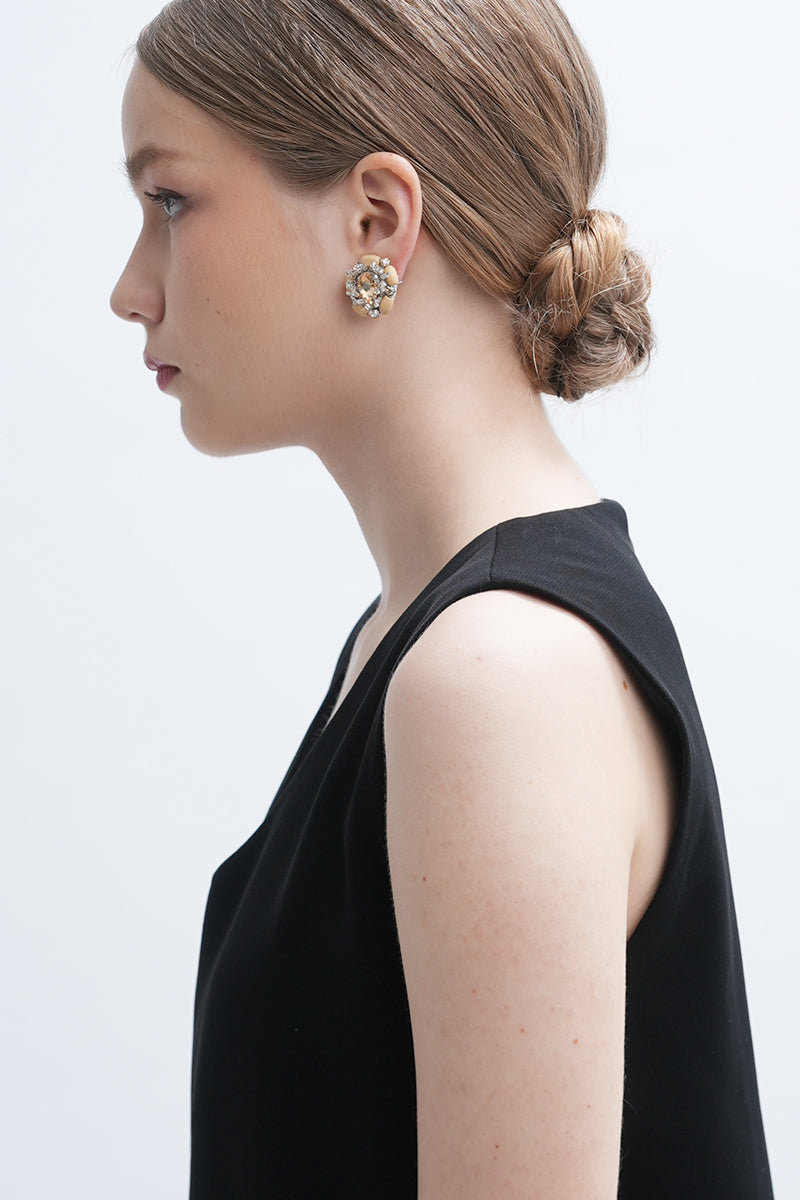 Aidan & Ice Sand Cascade Earrings featuring layered, sandy-toned earrings with a cascading design, hanging elegantly.
